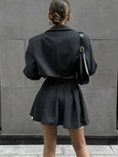 Conjunto Blazer Curto e Mini Saia Plissada